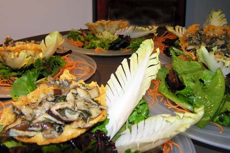 Parmesan Cup Filled with Wild Mushrooms on a Bed on Mixed Green with Truffle Vinaigrette